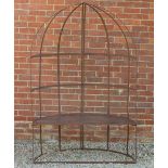 A SEAT ARBOUR of semi circular form with arching top, approximately 120cm wide x 62cm deep x 185cm