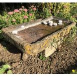 A LIME STONE SHALLOW TROUGH, 96.5cm wide x 51cm deep x 13cm high