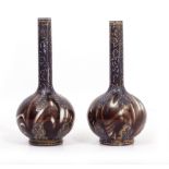 A PAIR OF LATE 19TH CENTURY FRENCH GLASS AND ENAMEL DECORATED BOTTLE VASES 13cm diameter x 29cm