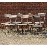 A SET OF EIGHT BEECHWOOD SLATTED GARDEN CHAIRS with turned legs and label for Wallace King Limited
