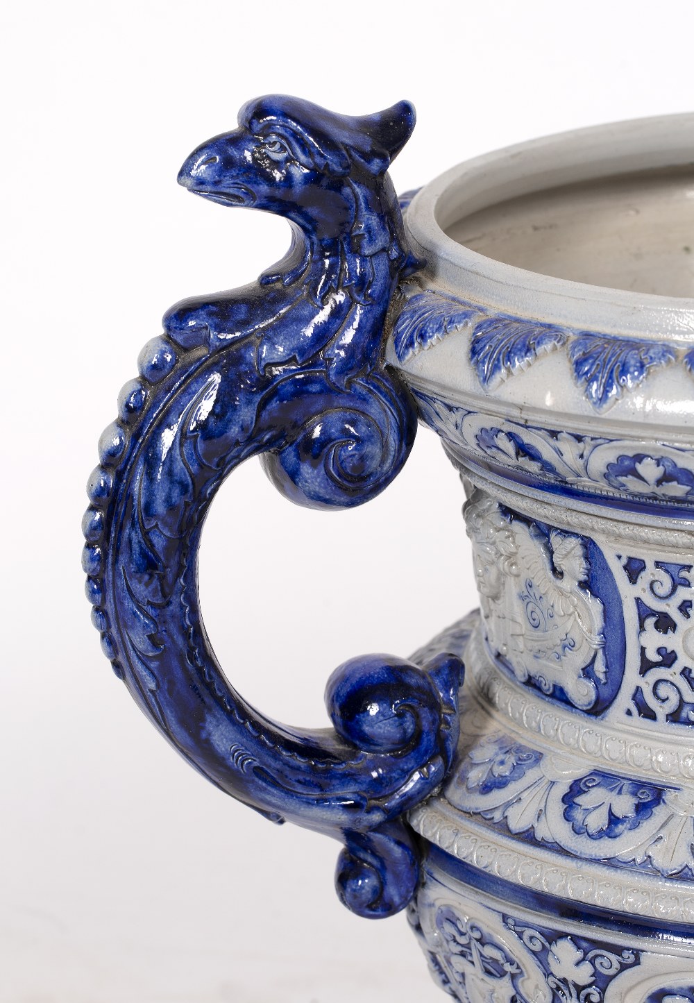 A LATE 19TH CENTURY GERMAN STONEWARE URN and similar stand, decorated in blue, the urn with eagles - Bild 9 aus 10