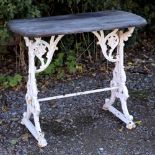 A VICTORIAN CAST IRON TABLE BASE with a later hardwood top, in the manner of Coalbrookdale, 91cm