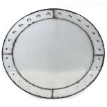 A CIRCULAR WALL MIRROR in the Irish manner with engraved mirrored roundel's to the bordering slips