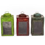 A GROUP OF THREE PAINTED TIN SQUARE SECTION LANTERNS glazed to one side and with tin lids with