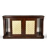 A WILLIAM IV ROSEWOOD MARBLE TOPPED SIDE CABINET with silk backed brass mesh panel twin doors