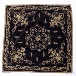 A PIECE OF ANTIQUE, POSSIBLY 18TH CENTURY, BLACK VELVET with silver wire and embroidered floral