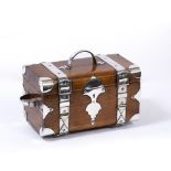 A VICTORIAN OAK SMOKERS BOX in the form of a travelling bag with silver plated strap mounts and