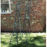 A PAIR OF GREEN PAINTED WROUGHT IRON FIVE TIER PLANT OR AURICULA STANDS 42cm wide x 150cm high