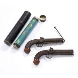 A PAIR OF EARLY 19TH CENTURY PISTOLS by Jackson of Nottingham with octagonal barrels enclosed ram