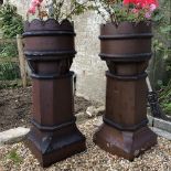 A PAIR OF VICTORIAN SALT GLAZED CROWN TOP CHIMNEY POTS with square section bases, the tops 37cm