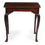 AN 18TH CENTURY IRISH MAHOGANY RECTANGULAR OCCASIONAL TABLE with inverted corners, shaped frieze and