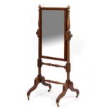 AN EARLY 19TH CENTURY MAHOGANY CHEVAL MIRROR with cushion moulded frame to the rectangular mirror