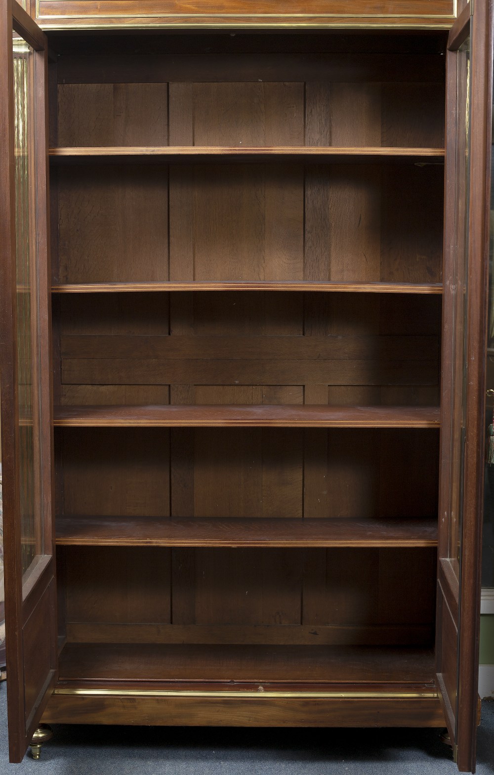 A FRENCH 19TH CENTURY MAHOGANY AND BRASS MOUNTED BOOKCASE with shaped crest, cast pineapple - Image 2 of 2