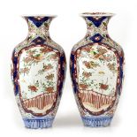 A PAIR OF IMARI COLOURED PORCELAIN VASES of inverted baluster form decorated birds and branches