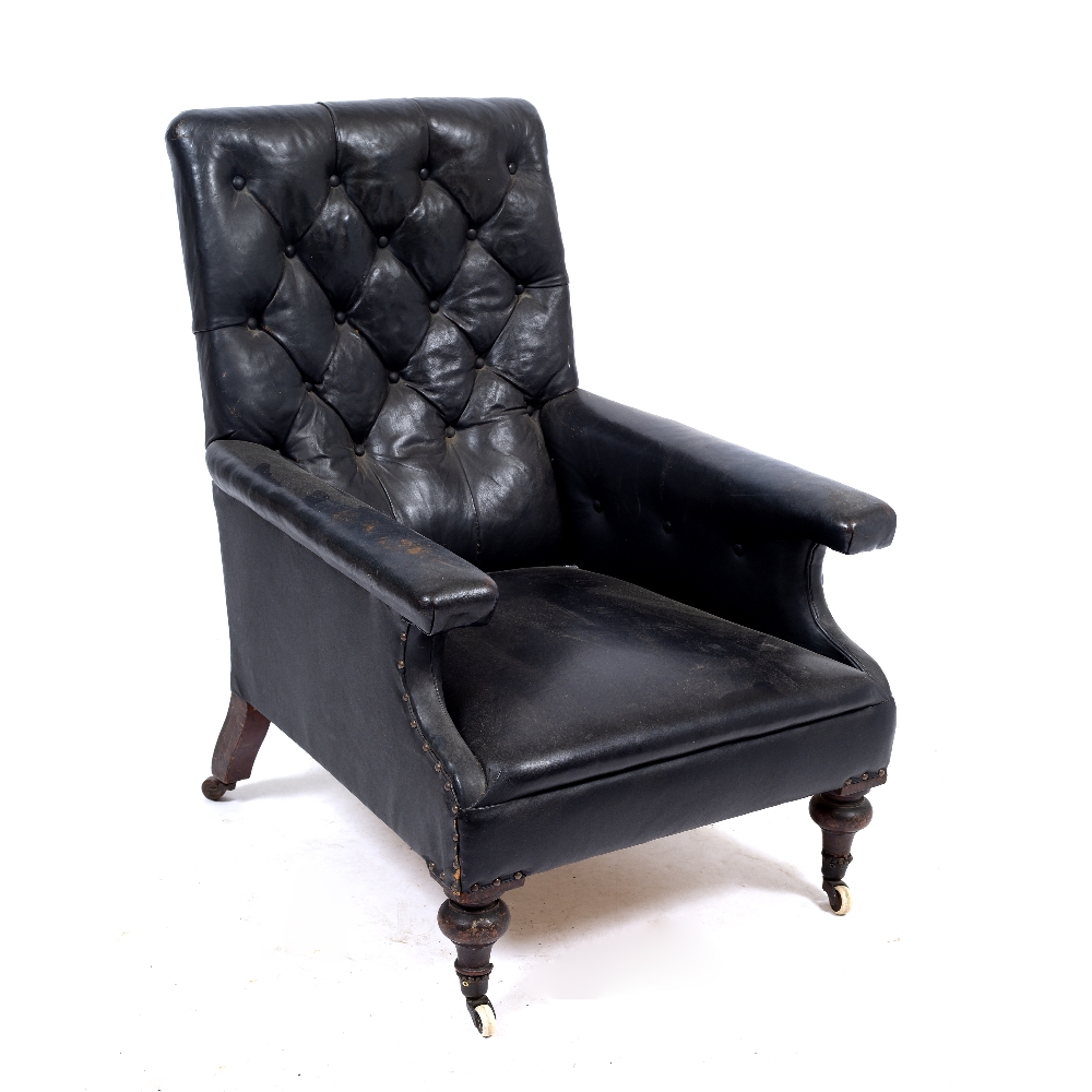 A VICTORIAN LEATHER UPHOLSTERED DEEP ARMCHAIR with button back, turned front legs and ceramic - Image 2 of 4