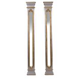 A PAIR OF SILVER PAINTED AND PARCEL GILT ARCHITECTURAL MIRRORED PILASTERS each 29.5cm wide x 9cm