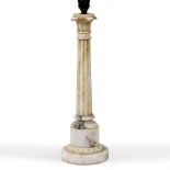 A TURNED ALABASTER TABLE LAMP of fluted classical column form, the base 12cm diameter and the lamp