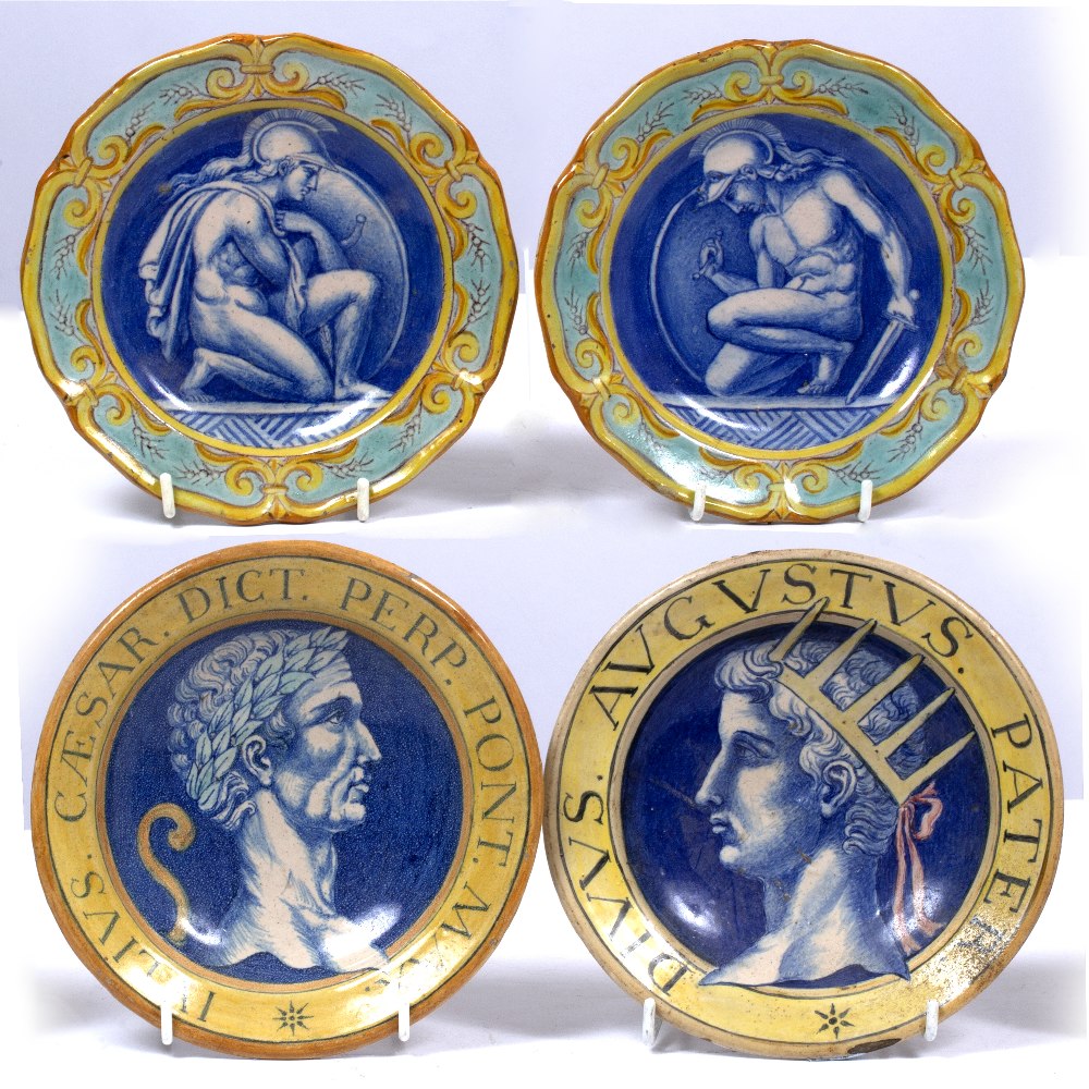 A PAIR OF ITALIAN TIN GLAZED RENAISSANCE STYLE MAJOLICA DISHES depicting the Roman Emperors Caesar