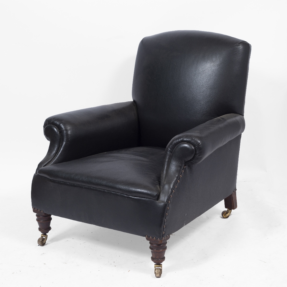 A VICTORIAN BLACK LEATHER UPHOLSTERED DEEP ARMCHAIR with scrolling arms, turned front legs and brass - Image 2 of 4