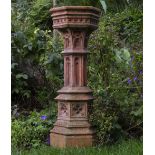 A CAST TERRACOTTA COLOURED GOTHIC REVIVAL STYLE SCULPTURE PLINTH with hexagonal top, 29cm wide x