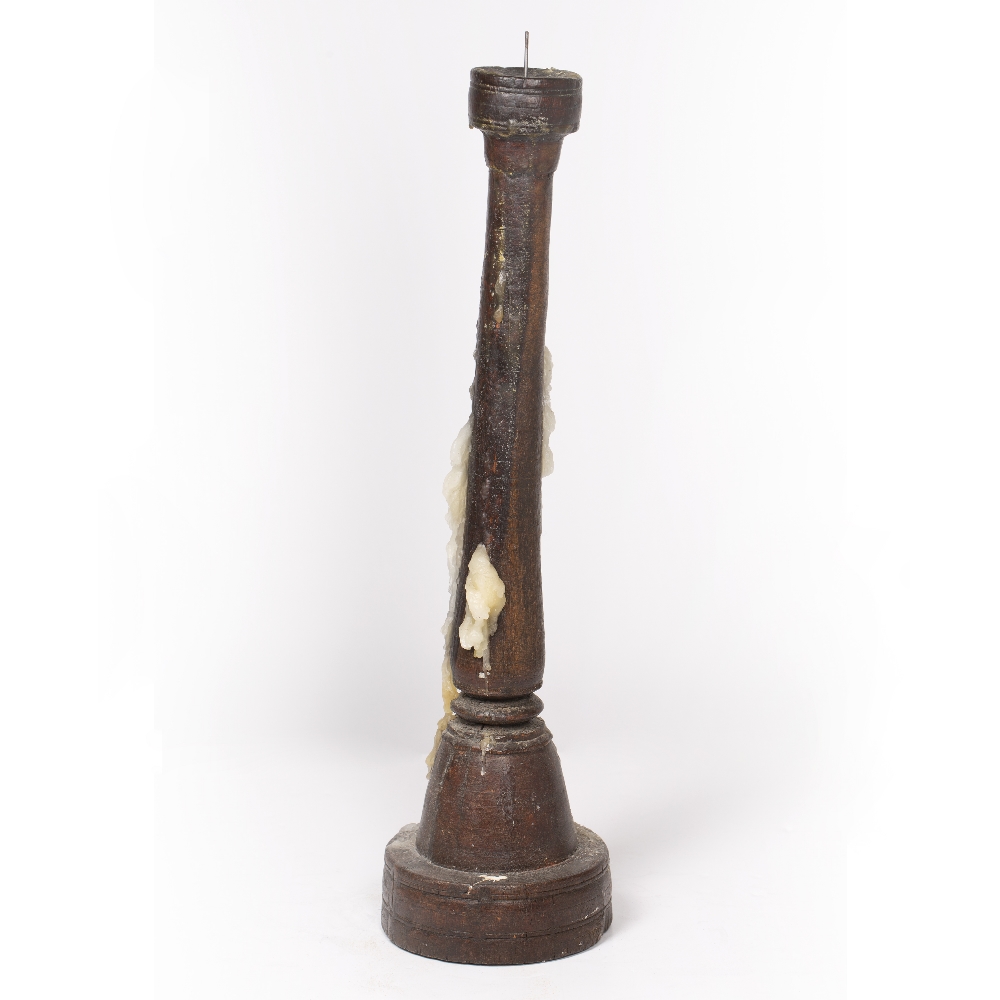 A TURNED AND CARVED HARDWOOD PRICKET CANDLESTICK 17cm diameter at the base x 63cm high - Image 2 of 2