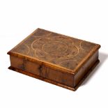 AN EARLY 18TH CENTURY WALNUT LACE BOX with oyster veneered lid, 43cm wide x 32cm deep x 11.5cm high