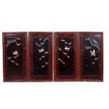 A SET OF FOUR ORIENTAL LACQUERED MOTHER OF PEARL AND ABALONE SHELL INSET SCREEN PANELS depicting