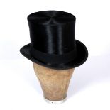 AN OLD BLACK SILK TOP HAT interior dimensions 19cm front to back and 15cm side to side; together