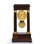 A 19TH CENTURY FRENCH MAHOGANY PORTICO MANTEL CLOCK with gilt engine turned Roman dial, twin train