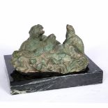 A 20TH/21ST CENTURY THREE SEALS RESTING ON A ROCK bronze, unsigned mounted on a marble plinth, the