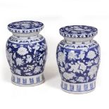 A PAIR OF CHINESE CONTEMPORARY CIRCULAR BLUE AND WHITE PORCELAIN SEATS OR STANDS, 27cm diameter, the