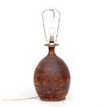 A CONTEMPORARY STONEWARE STUDIO POTTERY TABLE LAMP of ovoid form with impressed decoration and