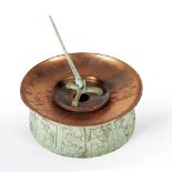 A CAST GREEN PATTERNATED METAL AND COPPER GARDEN SUNDIAL by Swedish designer Sune Rooth, the