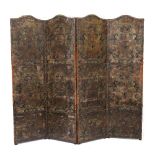 A 19TH CENTURY PAINTED AND EMBOSSED LEATHER MOUNTED FOUR FOLD SCREEN each section with an arching