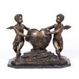 A LATE 20TH CENTURY BRONZE SCULPTURE depicting two cherubs around a central urn encrusted with