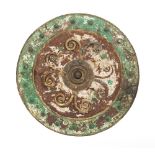 A 19TH CENTURY TIN AND BRASS GRECIAN STYLE PROP SHIELD with traces of original painted decoration,