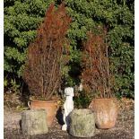 TWO COMPOSITE STONE PLANTERS of naturalistic log form, 31cm diameter x 29cm high together with two