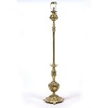 A VICTORIAN BRASS LAMP STANDARD with pierce foliate decoration to the oil reservoir and knopped
