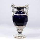 A BLUE GROUND MEISSEN PORCELAIN VASE of classical form with scrolling handles and swan head