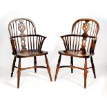 A PAIR OF LATE 20TH CENTURY ASH AND ELM WINDSOR ARMCHAIRS with turned legs and crinoline stretchers,