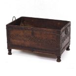 AN ANTIQUE CARVED HARDWOOD OPEN TOP BOX OR LOG BIN 59.5cm wide x 37.5cm deep x 34cm high