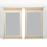 A PAIR OF WHITE PAINTED RECTANGULAR PIER GLASSES OR MIRRORS with parcel gilt decoration and bevelled