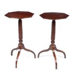 A PAIR OF MAHOGANY OCTAGONAL WINE TABLES with reeded column supports and tripod bases, 38.5cm wide x