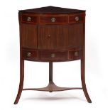 AN 18TH CENTURY MAHOGANY FOLD OVER TOP CORNER WASH STAND in the manor of Gillows with three
