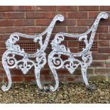 A PAIR OF WHITE PAINTED CAST ALUMINIUM BENCH ENDS 81cm (2)