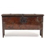 AN ANTIQUE, POSSIBLY A 17TH CENTURY OAK SIX PLANK CHEST OR COFFER with iron hinges and lock plate,