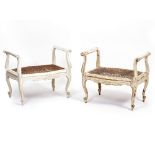A PAIR OF LATE 19TH / EARLY 20TH CENTURY WHITE PAINTED CARVED WOOD WINDOW SEATS the caned seats of