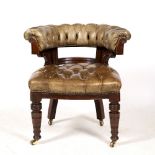 A VICTORIAN GREEN LEATHER UPHOLSTERED MAHOGANY FRAMED DESK CHAIR with horseshoe shaped back and