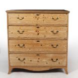 AN EARLY 19TH CENTURY PINE CHEST OF FOUR LONG DRAWERS with brass swan neck handles, hardwood moulded