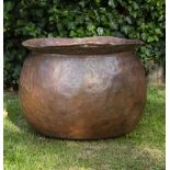 A CONTINENTAL ONION SHAPED COPPER with flaring rim, 56cm diameter x 42cm high